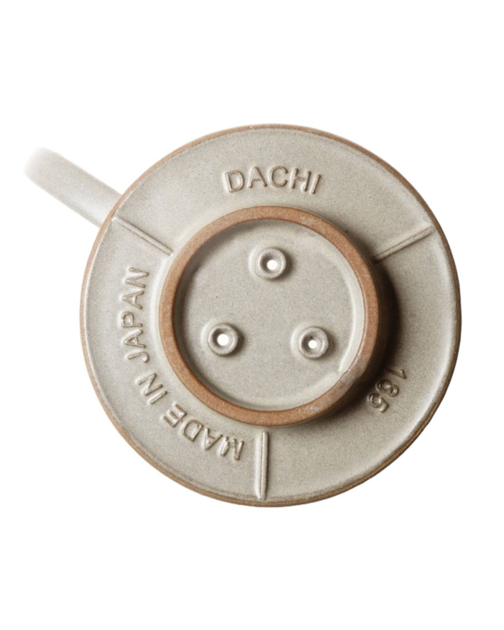 Kalita MI185 ceramic coffee dripper with three-hole design, made in Japan, featuring DACHI and Made in Japan inscriptions, in light gray color with brown rim