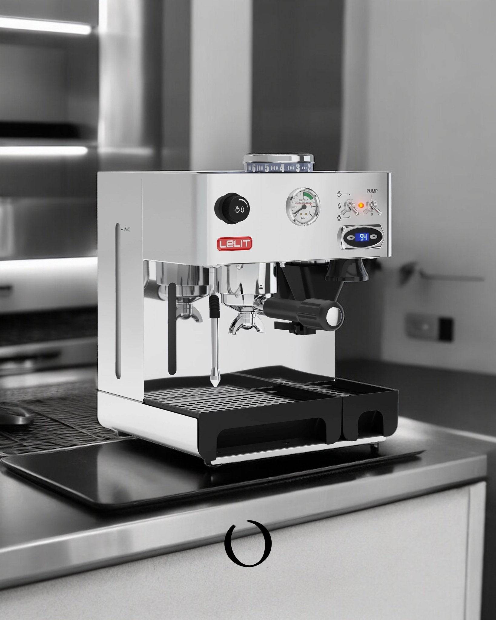 Lelit Anita pl042temd espresso machine with built-in grinder, PID temperature control, pressure gauge, and steam wand on stainless steel countertop in monochrome kitchen setting