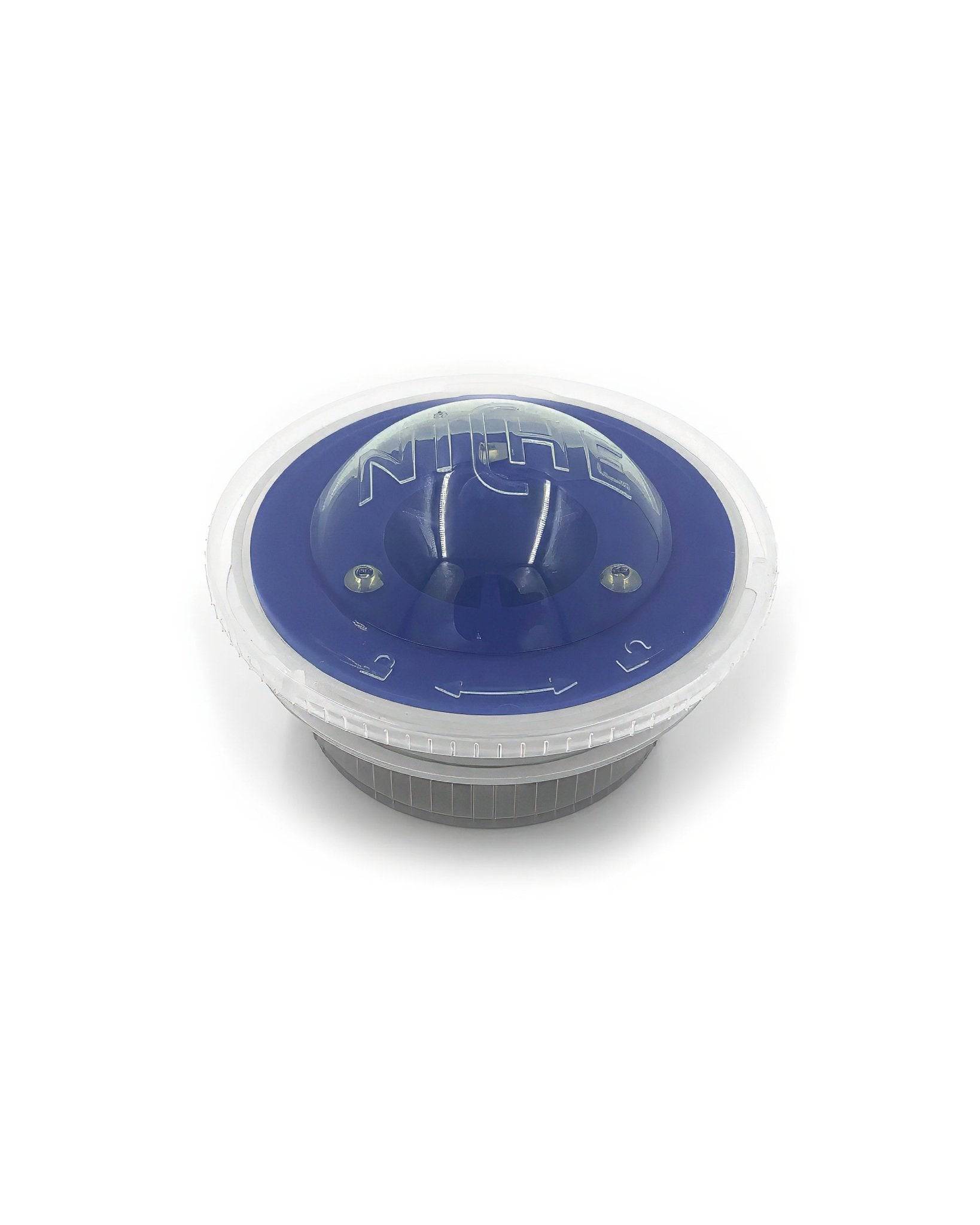 Blue and white circular component of Niche Duo coffee grinder with transparent lid and visible Niche logo, likely a grind adjustment or bean hopper part