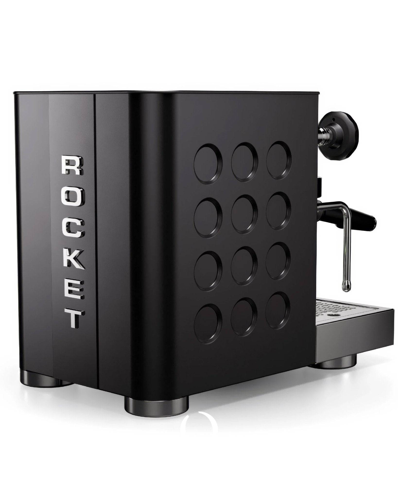 Rocket Appartamento TCA semi-automatic espresso machine in sleek black design with circular pattern on side panel and prominent Rocket branding
