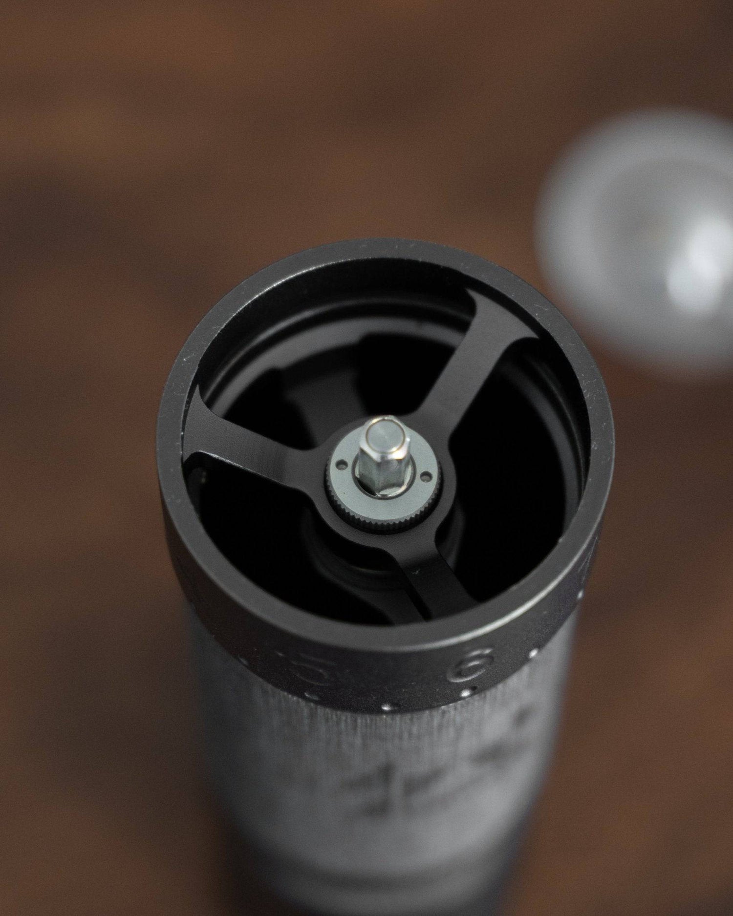 Close-up view of 1zpresso J MAXS manual coffee grinder&