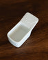 Kalita Hasami-yaki ceramic coffee scoop, 10g capacity, white rectangular design on wooden surface, Japanese craftsmanship, precise measuring tool for coffee enthusiasts