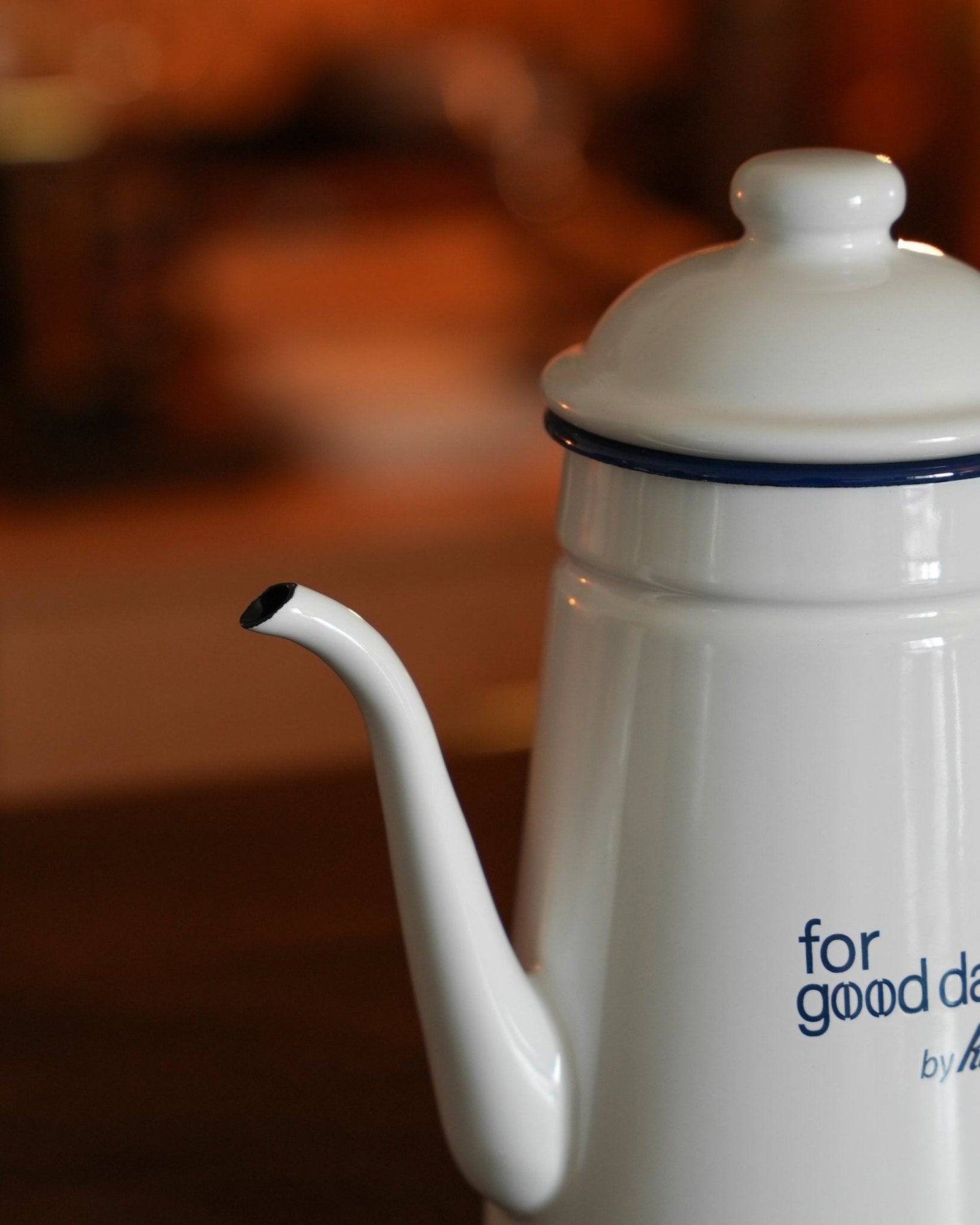 Kalita white enamel pour-over kettle, limited edition 1L, featuring "for good days" text, on warm wooden surface, perfect for precise coffee brewing