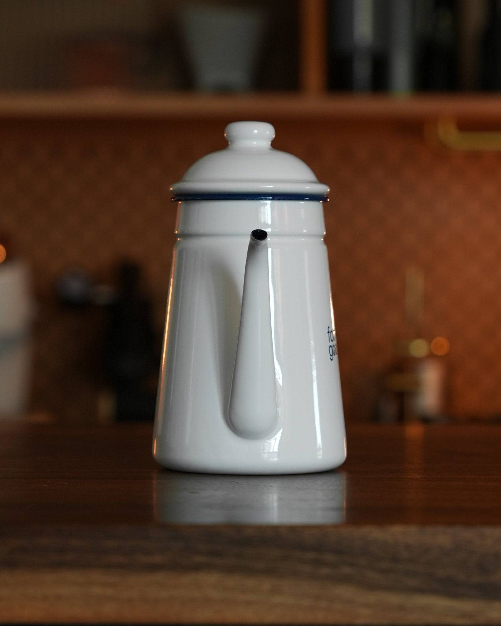 Kalita enamel pour-over kettle 1L white limited edition on wooden counter, sleek design with long spout for precise water control, ideal for coffee brewing