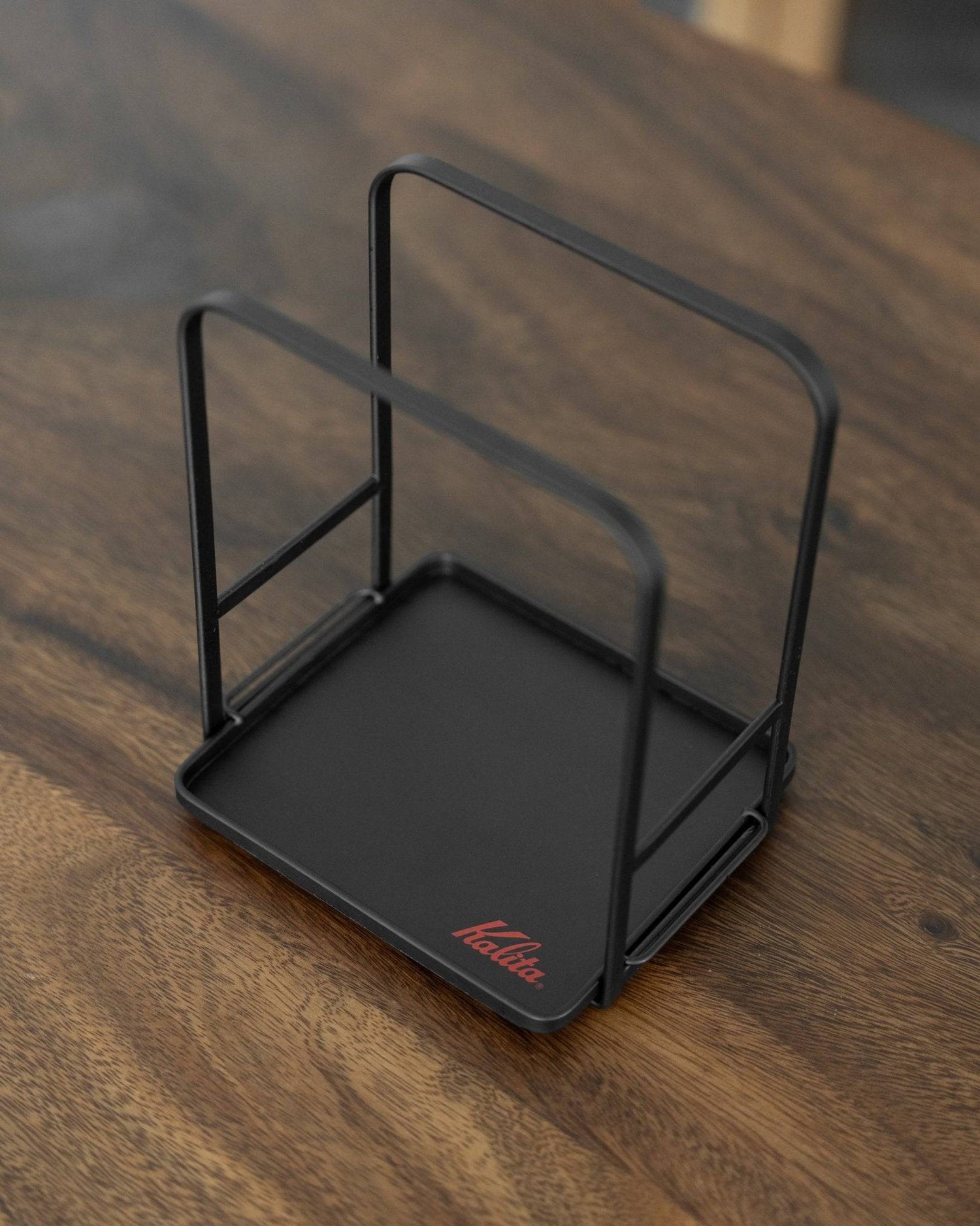 Kalita adjustable coffee dripper stand, black metal frame with square base, versatile height settings, sturdy design for various filter sizes, compact and stylish for home brewing