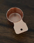 Copper Kalita coffee measuring scoop with 10g capacity, handcrafted in Tsubame, Japan, featuring a polished finish and elegant design for precise coffee dosing