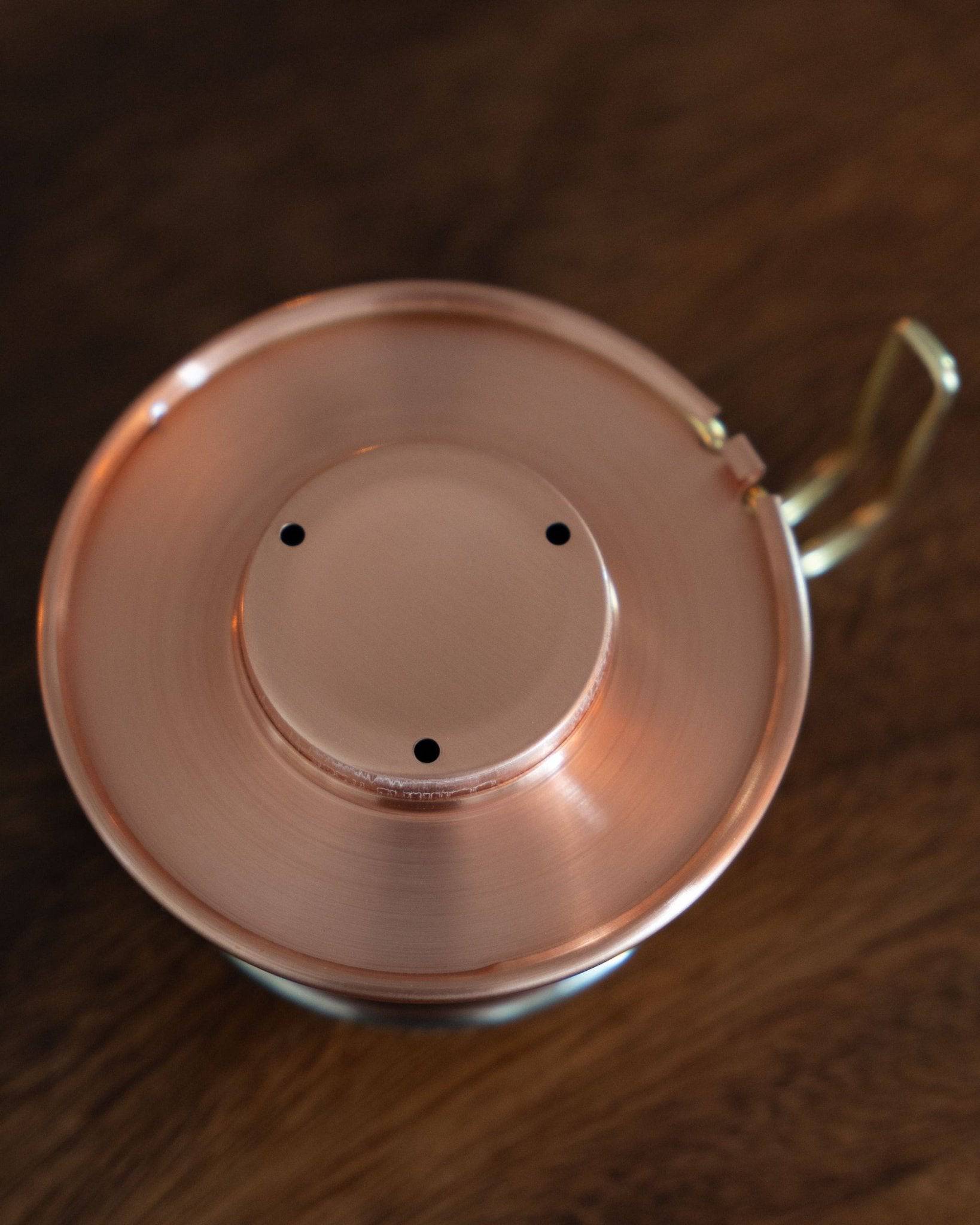 Copper Kalita & TSUBAME WDC-155 pour-over coffee dripper with three-hole design, showcasing its elegant copper construction and precise craftsmanship for optimal coffee brewing