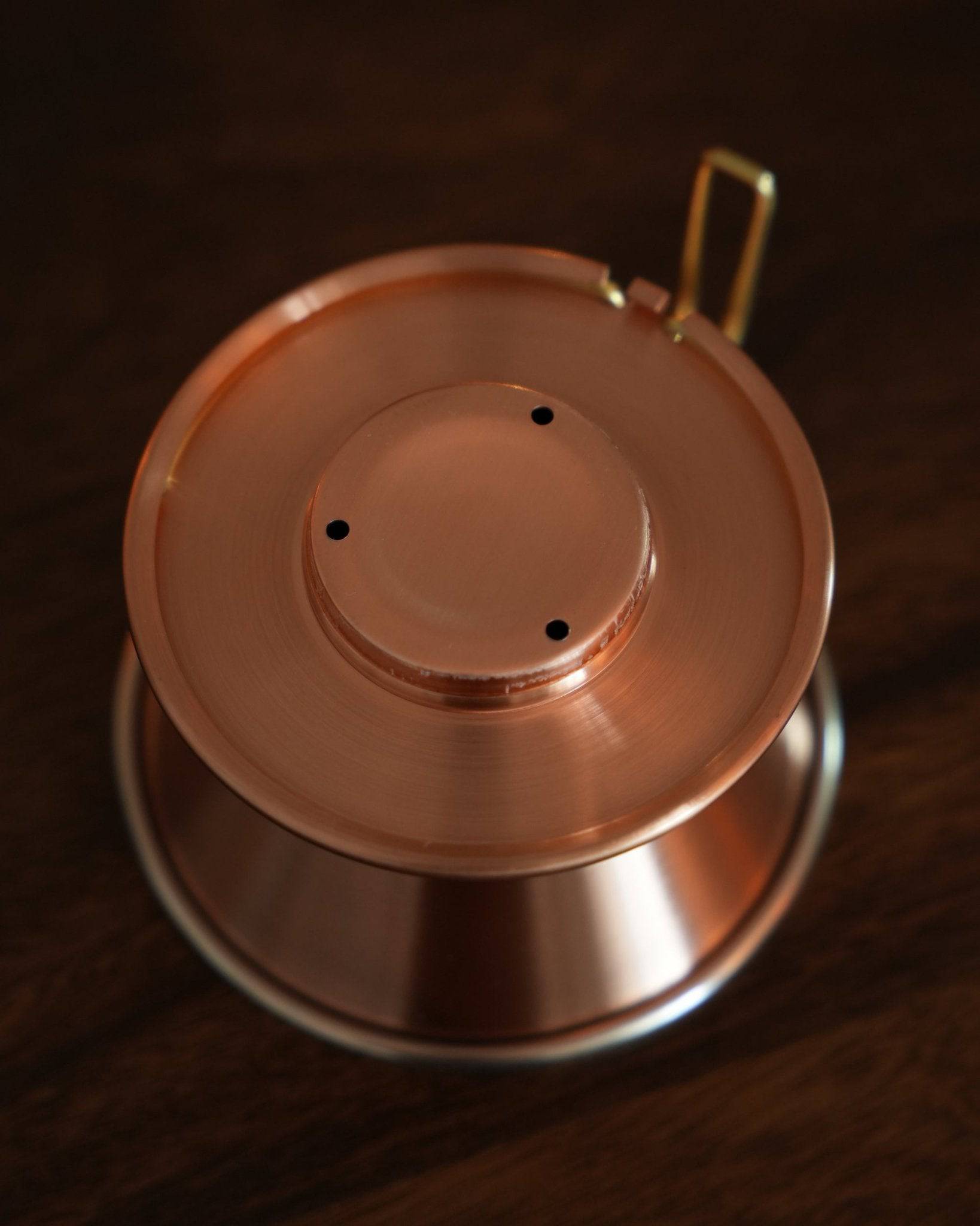 Copper Kalita & TSUBAME WDC-185 coffee dripper with three-hole design, handcrafted by Japanese artisans, showcasing elegant craftsmanship and superior heat conductivity for optimal coffee brewing