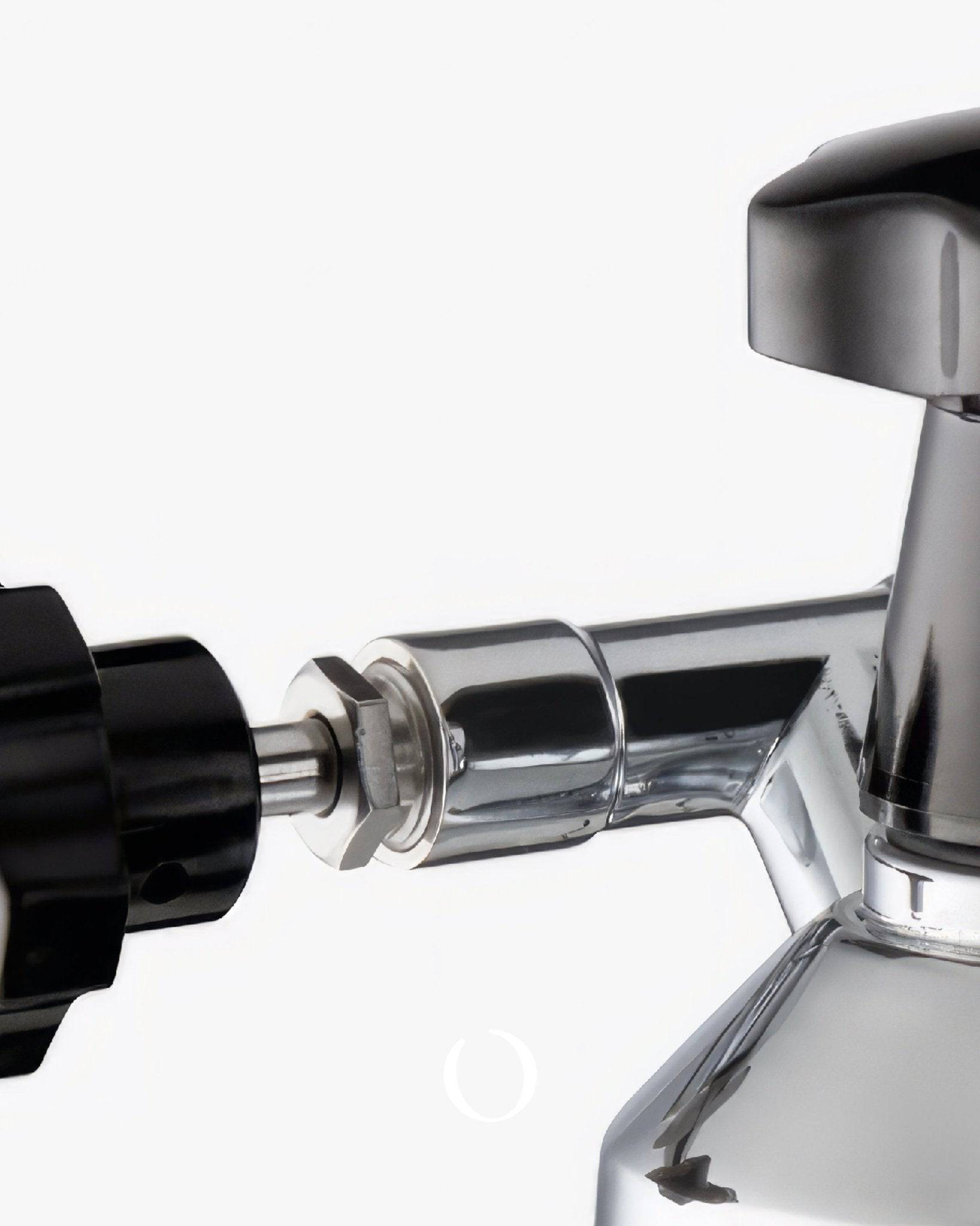 Close-up of La Pavoni Europiccola Lusso lever espresso machine, showing chrome-plated body, black handle, and steam wand detail. Sleek design highlighting craftsmanship and quality of this classic Italian coffee maker.