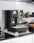 Lelit Bianca V3 espresso machine in sleek black with gold accents, featuring dual boilers and flow control, positioned on a modern kitchen countertop