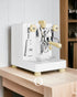 Lelit Bianca V3 white special edition espresso machine with wooden accents on countertop, featuring dual boiler system and flow control for precise brewing