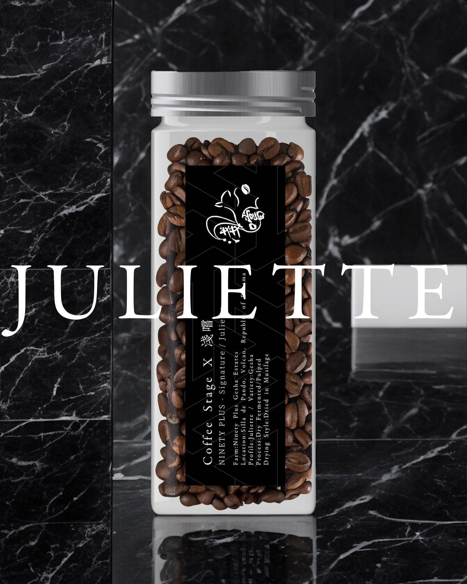 Glass jar of Ninety Plus Coffee Juliette beans with black label, displayed on dark marble background. Text "JULIETTE" in white overlays bottom of image.