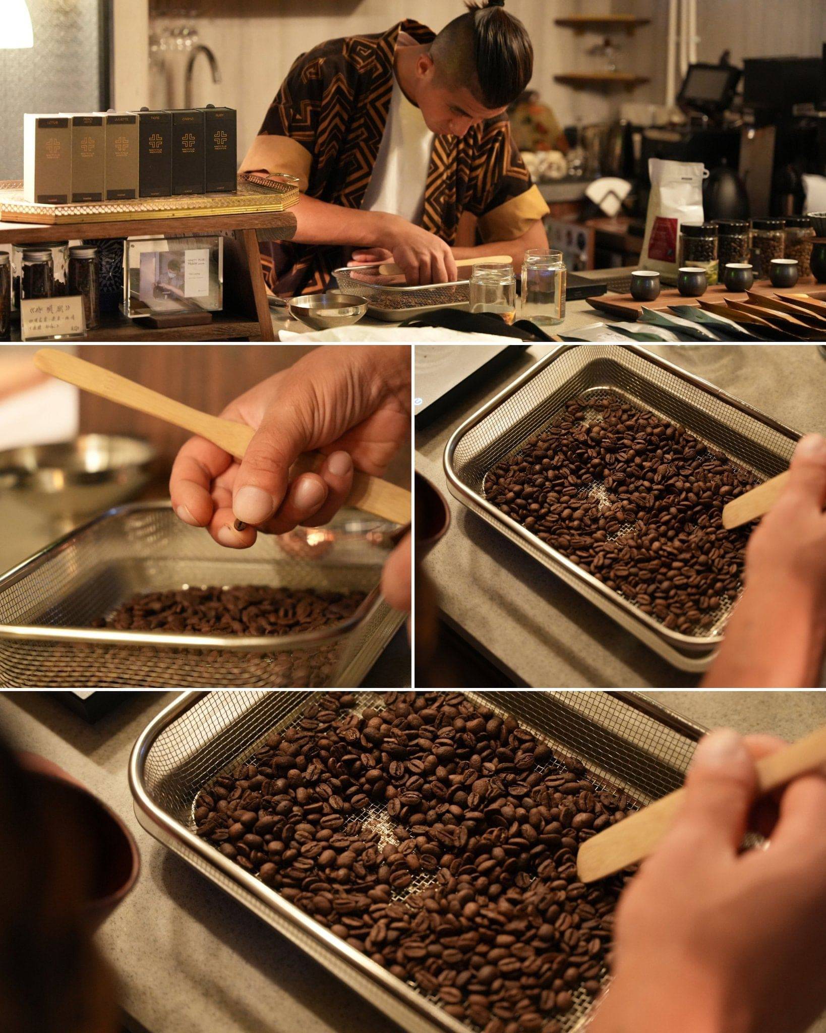 Barista carefully examining and selecting premium coffee beans for Ninety Plus Coffee, showcasing meticulous quality control and artisanal coffee preparation process