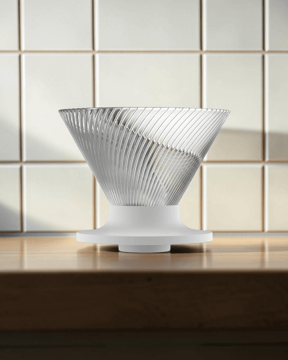 HARIO V60 NEO 02 clear pour-over coffee dripper on a Japanese-style coffee brewing counter, cover image candidate
