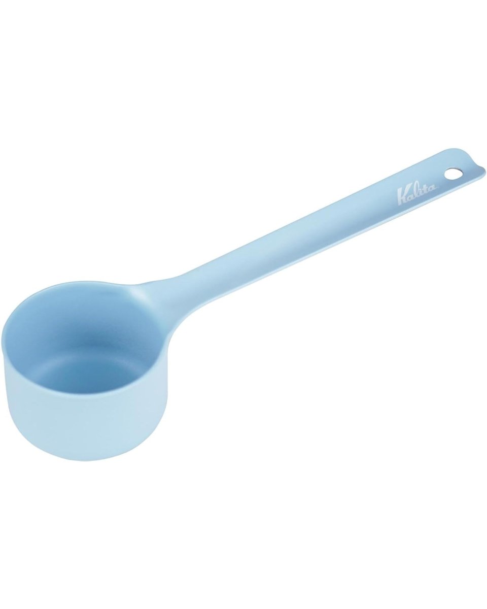 Full view of a Kalita Earth Series SORA sky-blue stainless steel coffee measuring scoop with a hanging hole at the end of its long handle