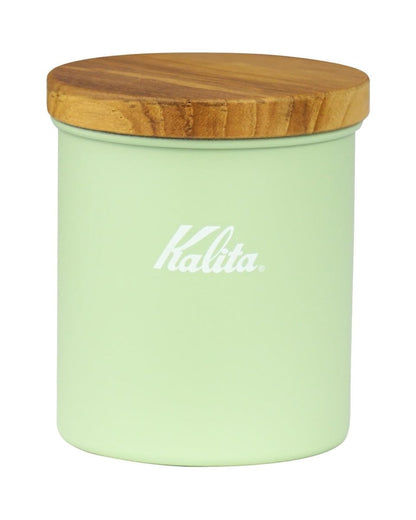 Front view of a Kalita Earth Series MORI forest-green stainless steel coffee bean canister with a natural wood lid
