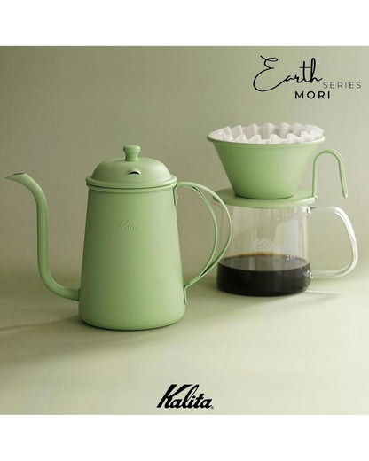 Colour-coordinated brewing set with a Kalita Earth Series MORI forest-green pour-over kettle and dripper plus a glass coffee server