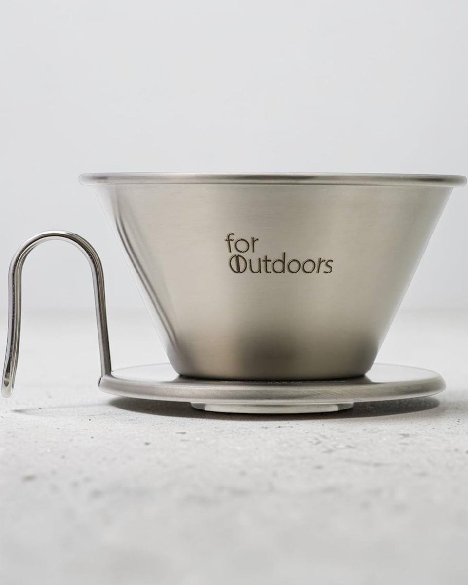 Kalita for Outdoors WDS-185K stainless steel Wave dripper on a light grey studio countertop