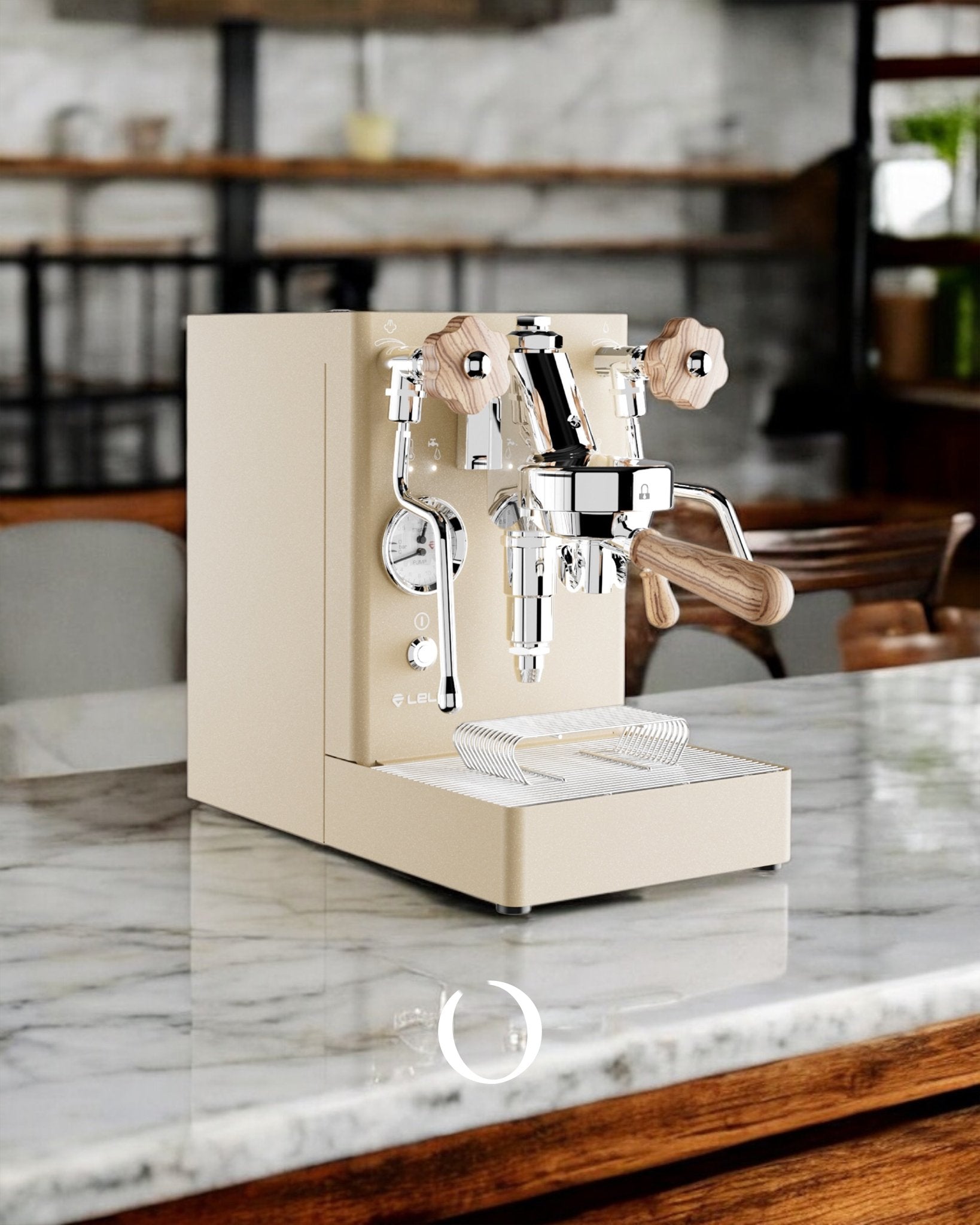 Lelit MaraX V2 gold espresso machine on marble countertop, featuring wooden accents and chrome details, in a stylish kitchen setting