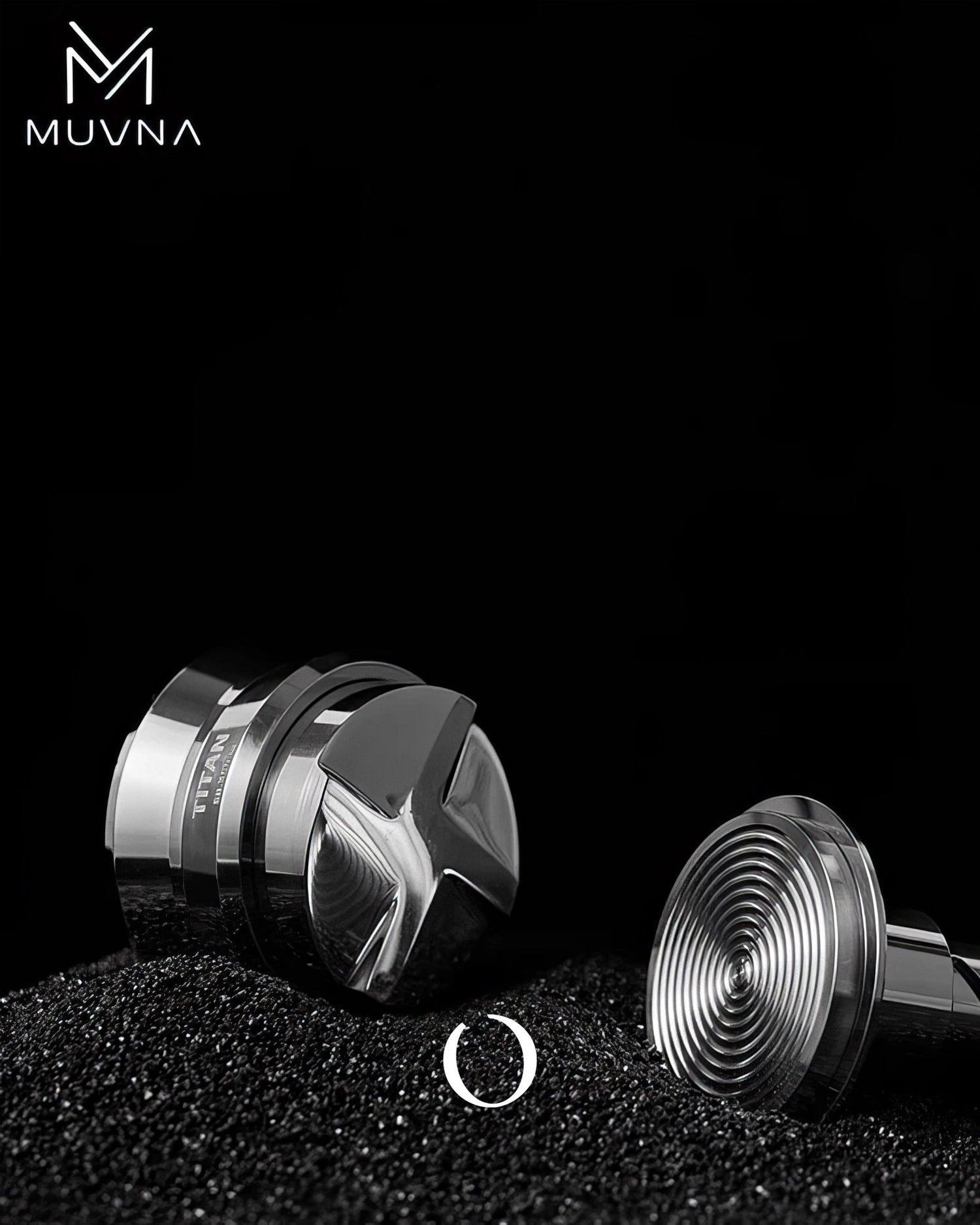 MUVNA Titan 58mm coffee distributor tool on black background with coffee grounds, showcasing its precision-engineered design for even distribution and improved espresso extraction