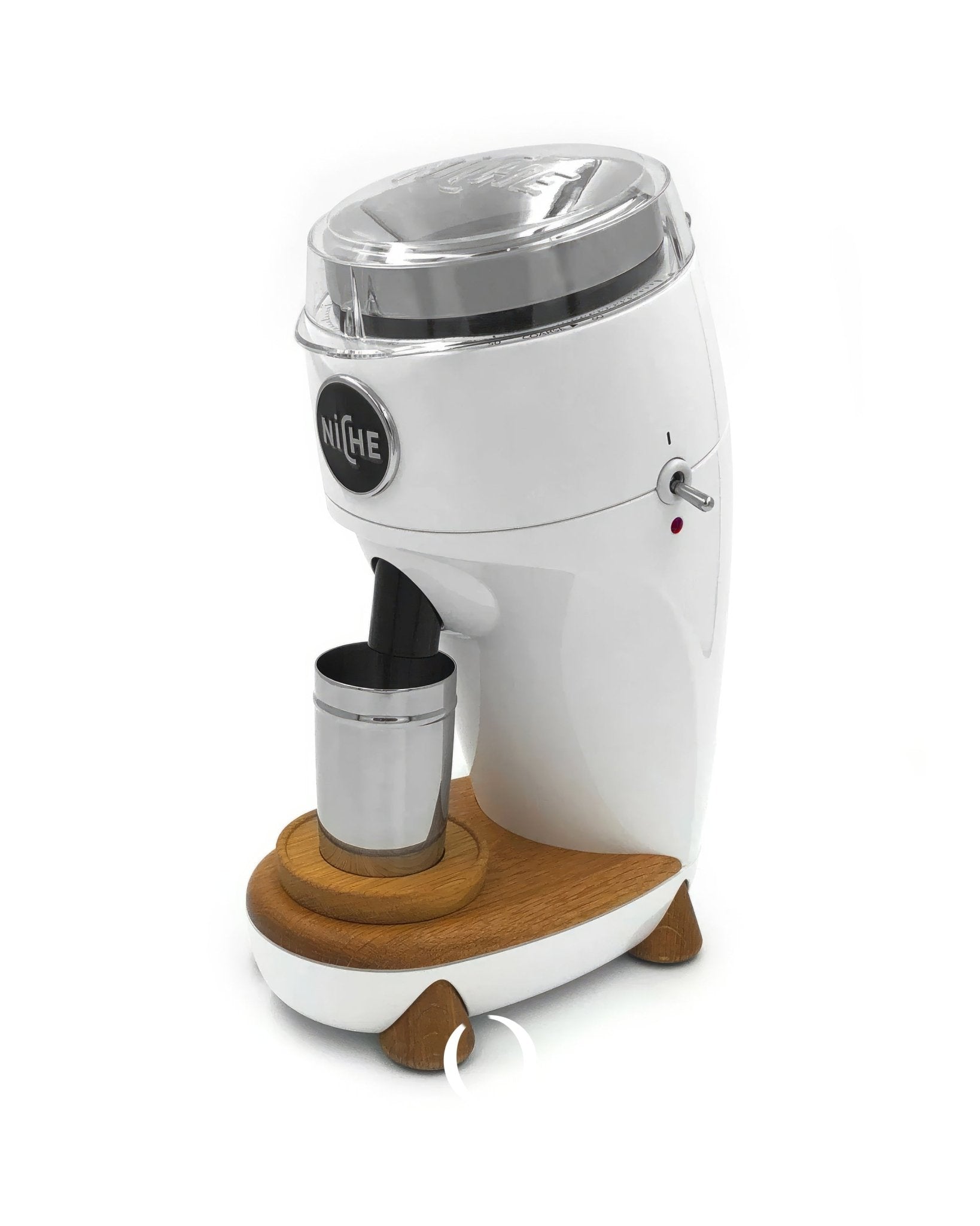 Niche Duo coffee grinder with white body, wooden base, and stainless steel cup, featuring dual burr design for precise grinding of espresso and filter coffee