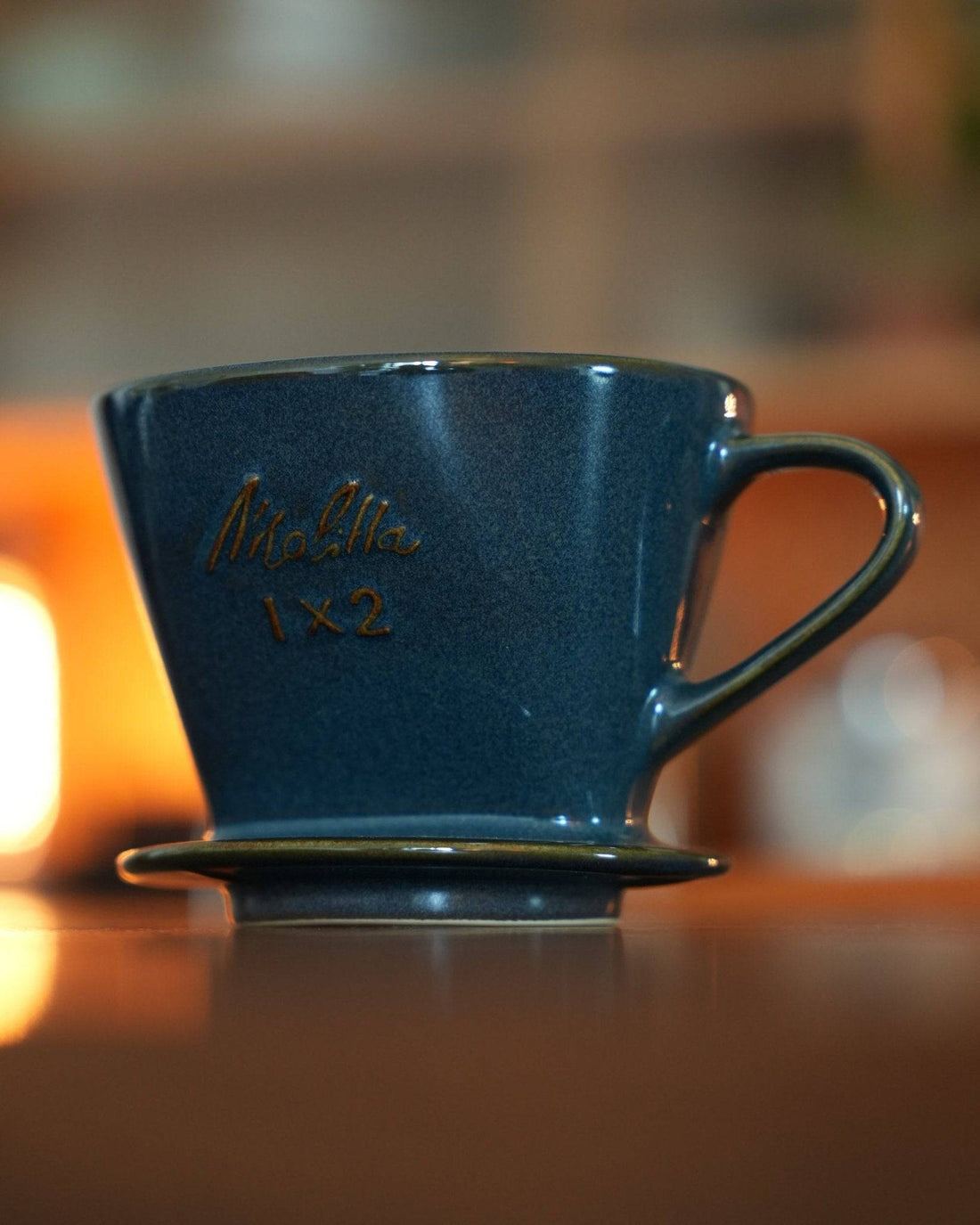 Melitta turquoise blue coffee dripper, 1x2 size, ceramic pour-over cone with elegant design, Japanese craftsmanship, perfect for brewing 2-4 cups of coffee, unique fan-shaped single hole for optimal extraction