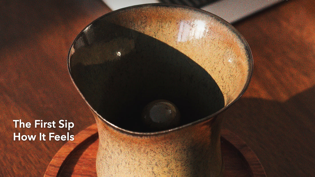 A photograph of Sharing Cup Beta Size showing the rim, central column and body curves. Cover title: The First Sip — How It Feels