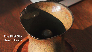 A photograph of Sharing Cup Beta Size showing the rim, central column and body curves. Cover title: The First Sip — How It Feels